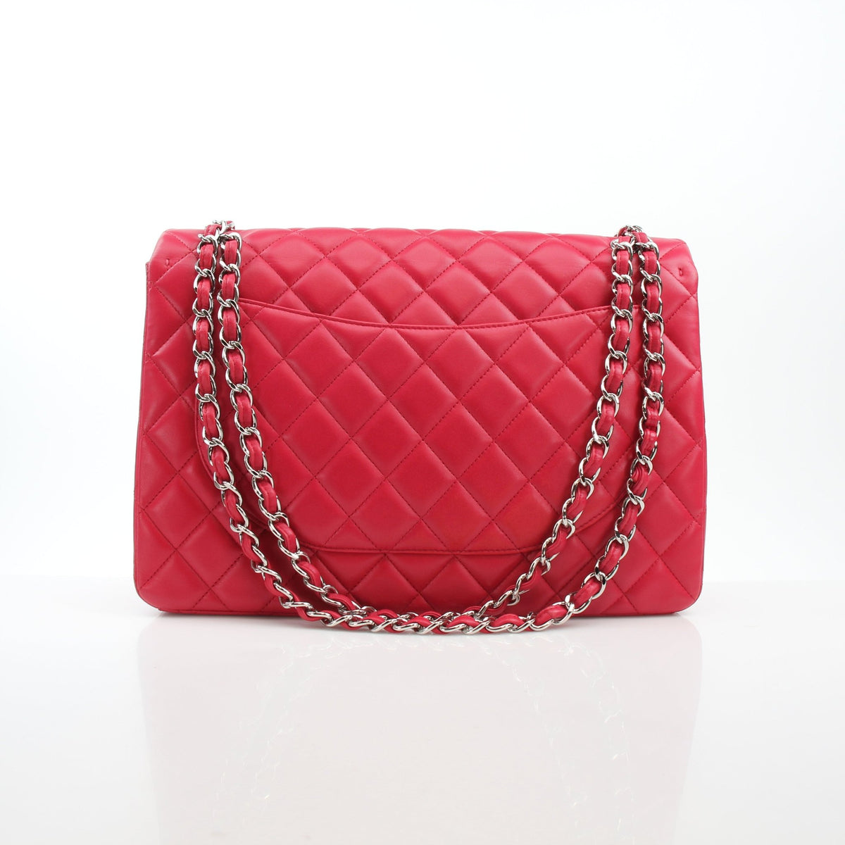 Chanel Classic Maxi Double Flap Red Lambskin Shoulder Bag with gold hardware, featuring quilted design and chain strap.
