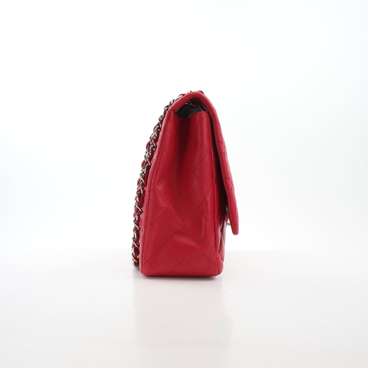 Chanel Classic Maxi Double Flap Red Lambskin Shoulder Bag with gold hardware, featuring quilted leather and chain strap.