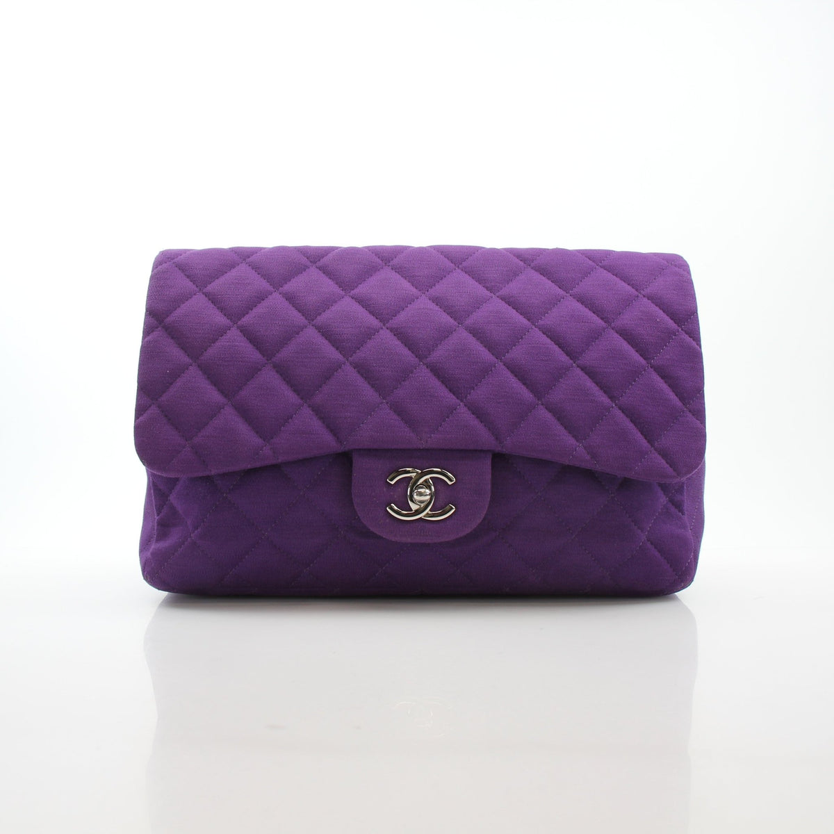 Chanel Classic Jumbo Purple Quilted Jersey Shoulder Bag with gold-tone hardware and single flap, elegant handbag design.
