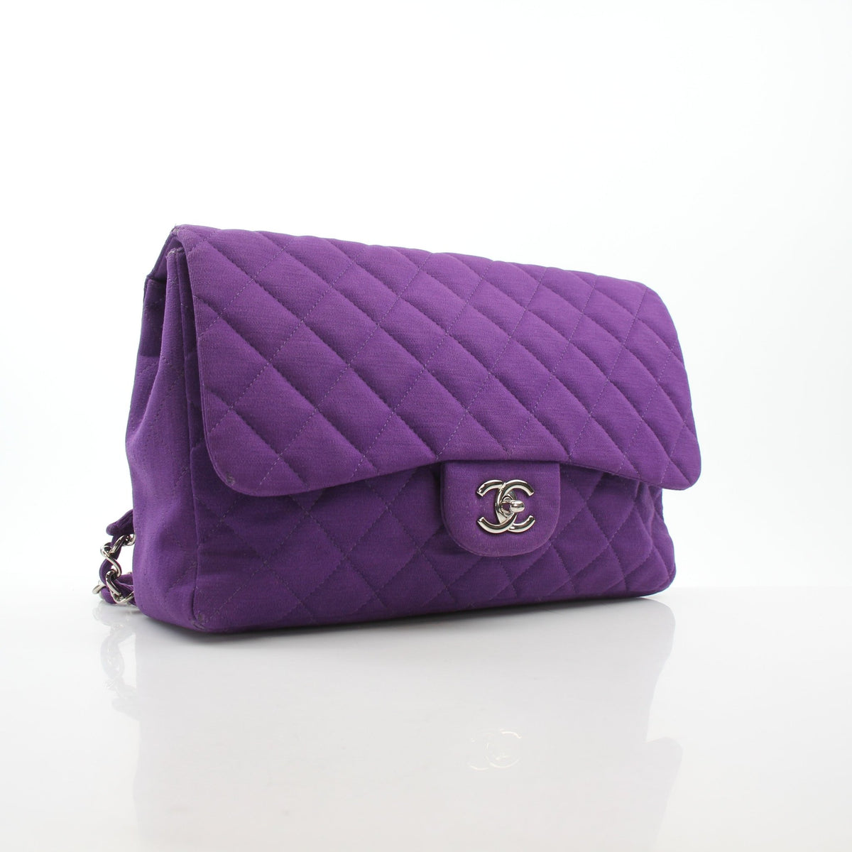 Chanel Classic Jumbo Purple Quilted Jersey Shoulder Bag with gold hardware and single flap, stylish and luxurious handbag.