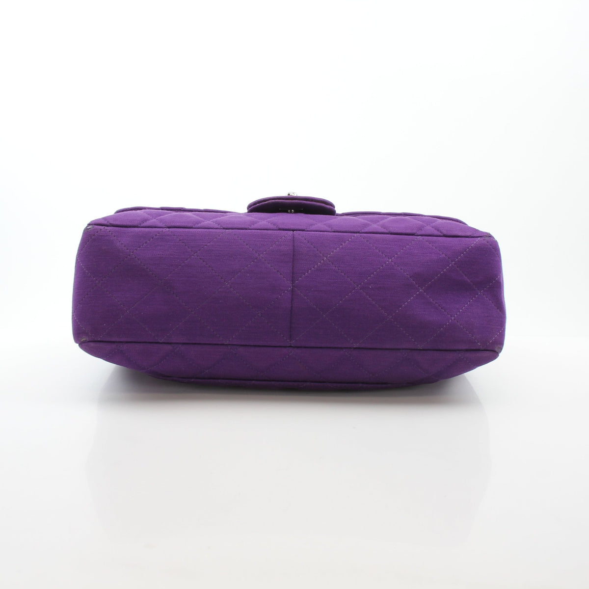 Chanel Classic Jumbo Purple Quilted Jersey Shoulder Bag with gold hardware and single flap, showcasing elegant quilting and shoulder strap.