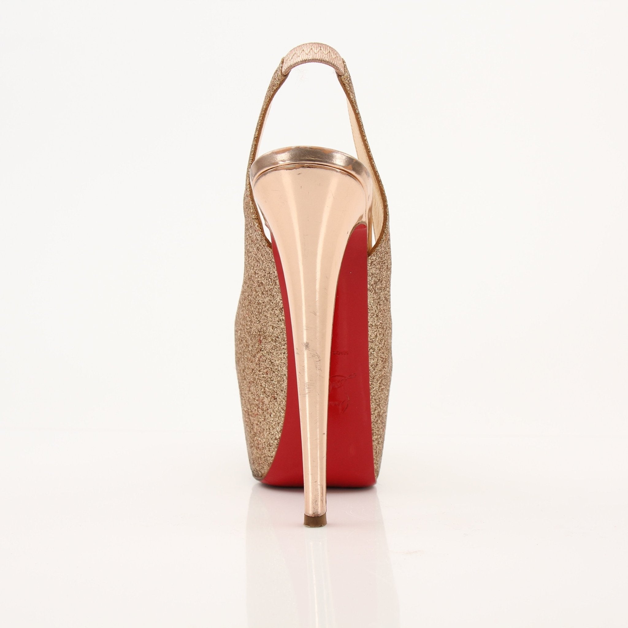 Christian Louboutin Daffodil sling heels with red sole and gold accents, showcased on a neutral background.