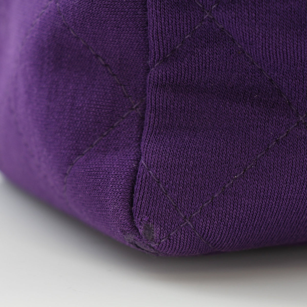 Chanel Classic Jumbo Purple Quilted Jersey Shoulder Bag with gold hardware and single flap closure.