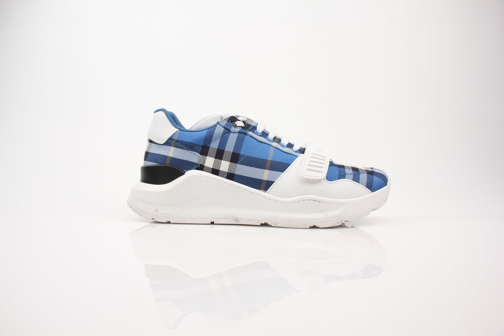 Gold & Beyond Burberry Check leather low top sneakers in size 14 US, featuring classic check pattern and casual shoe design.