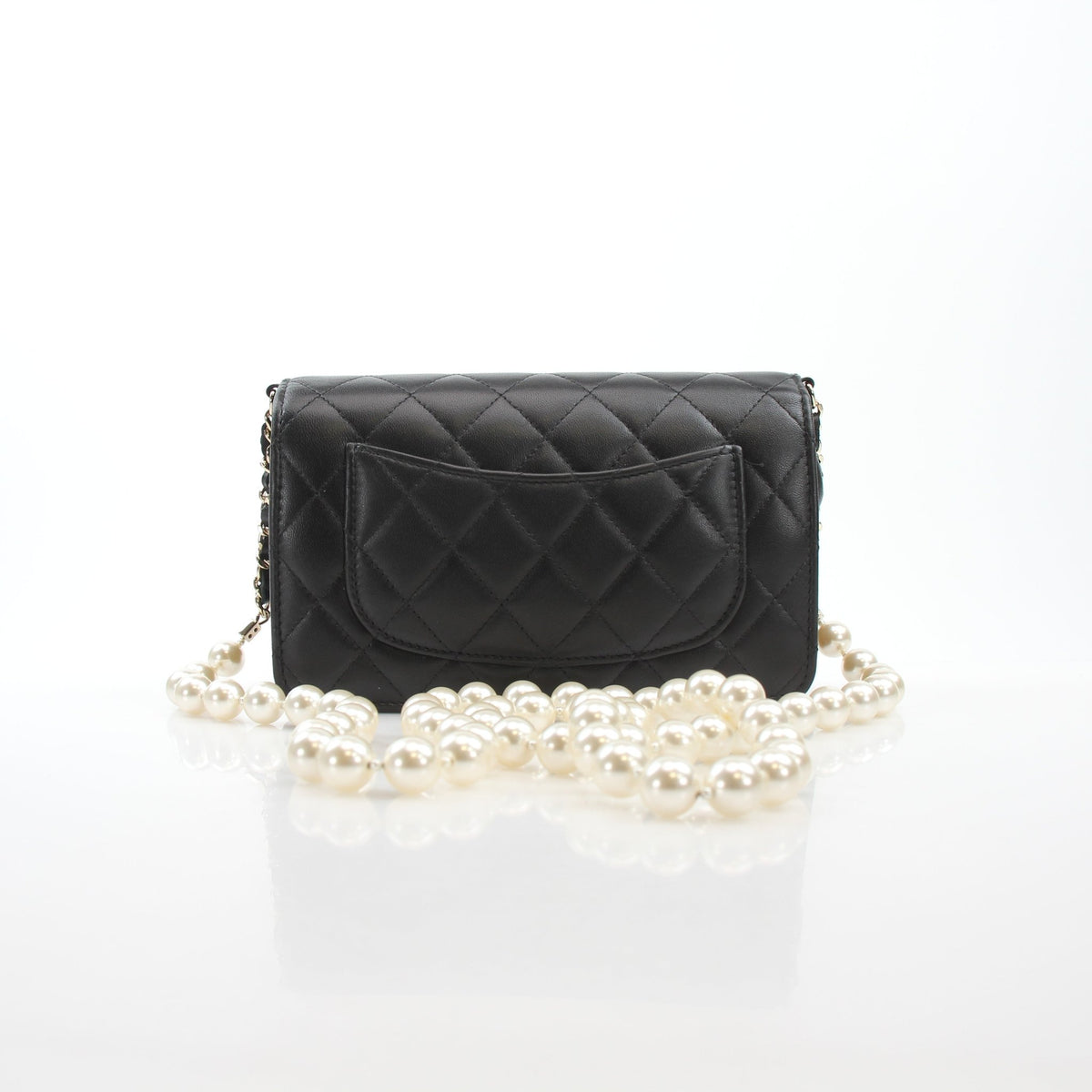 Chanel Pearly Chain Classic Wallet on Chain in black lambskin with pearl chain detail