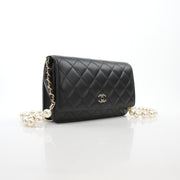 Chanel Pearly Chain Classic Wallet on Chain in black lambskin with gold chain strap