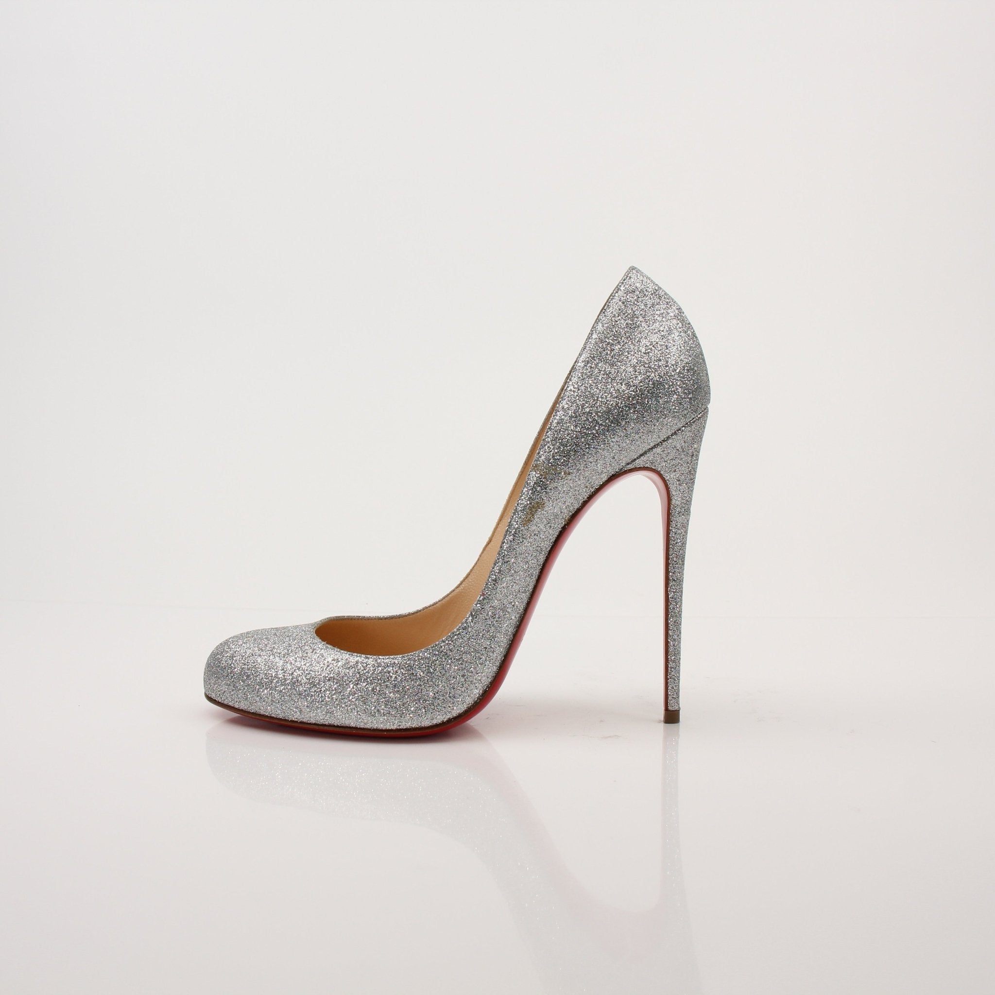 Christian Louboutin Fifille pump heels with red soles and sleek design, showcased on a neutral background.