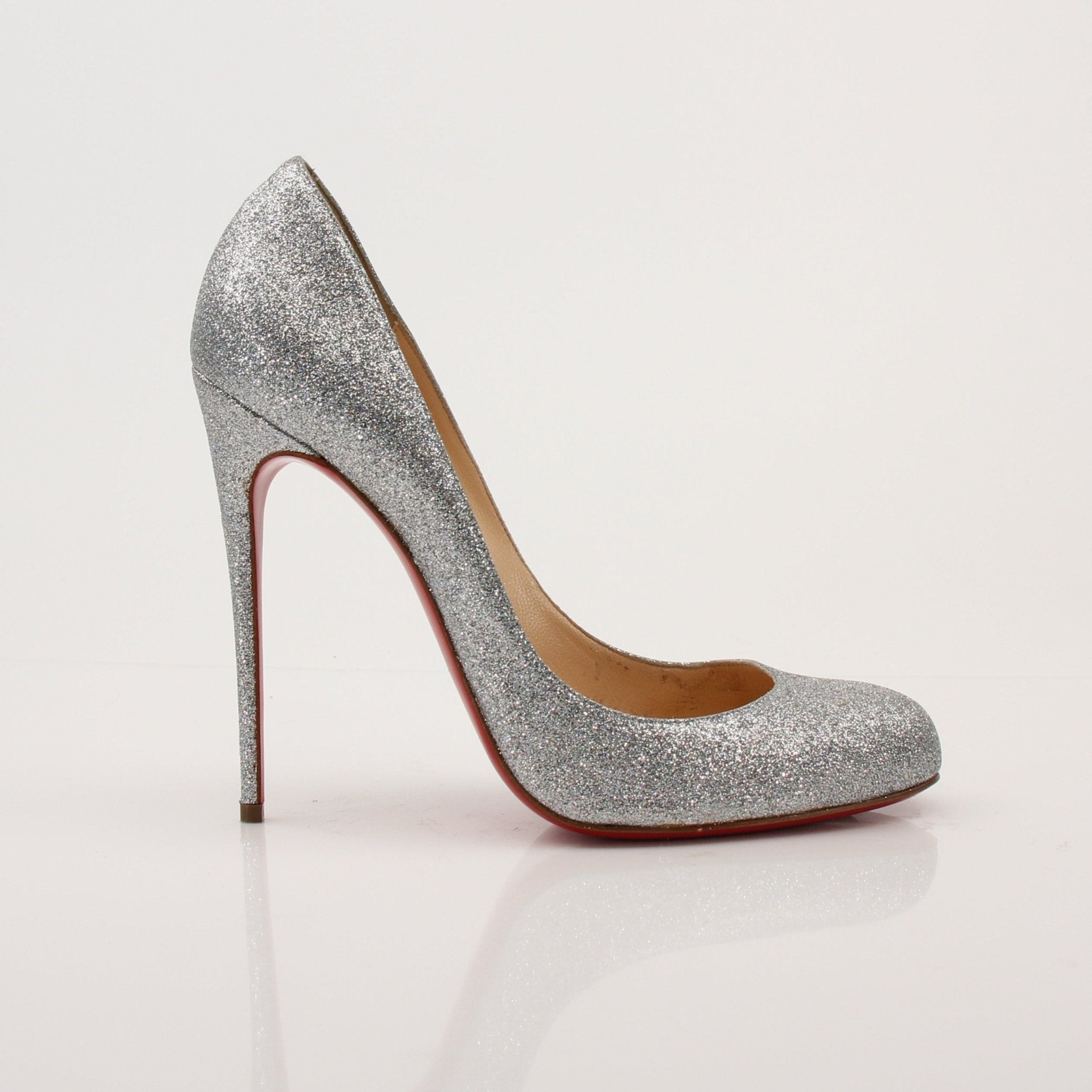 Gold & Beyond Christian Louboutin Fifille pump heels with red sole, black patent leather, and pointed toe.
