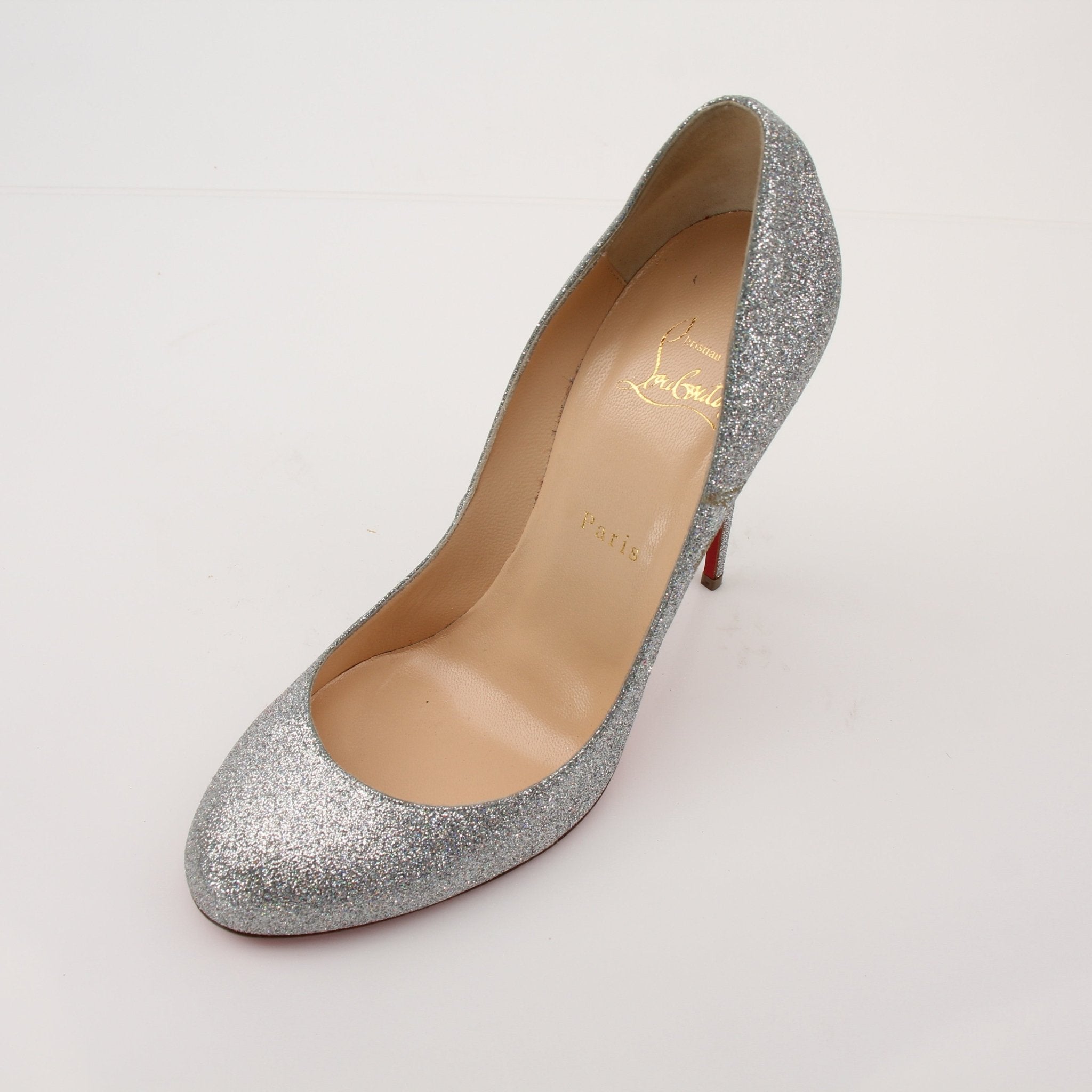 Gold & Beyond Christian Louboutin Fifille pump heels with red soles, featuring sleek design and high stiletto heels.
