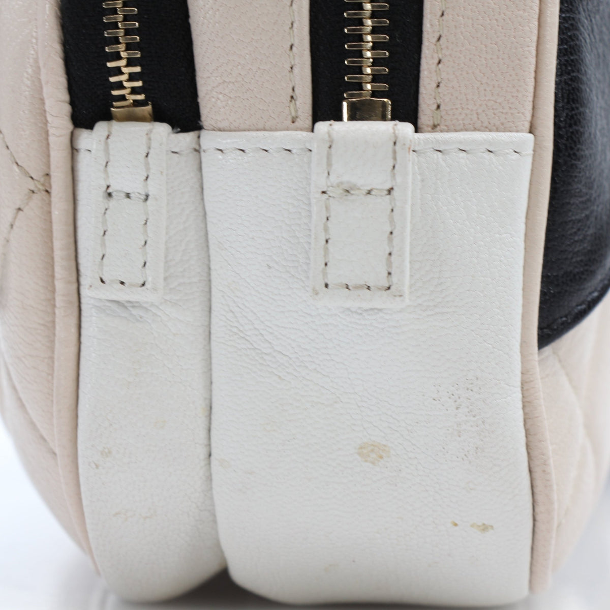 Chanel quilted tri-color In & Out belt bag handbag with contrasting panels and compact zippered design