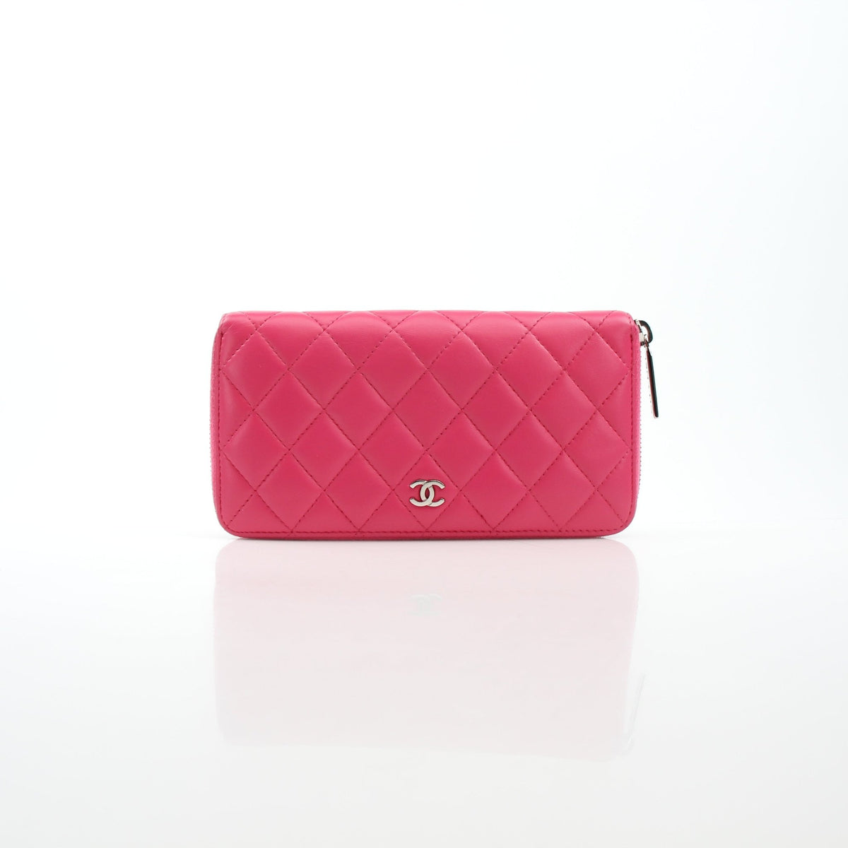 Chanel pink zip-around long wallet by Gold & Beyond, featuring a sleek rectangular design and wraparound zipper