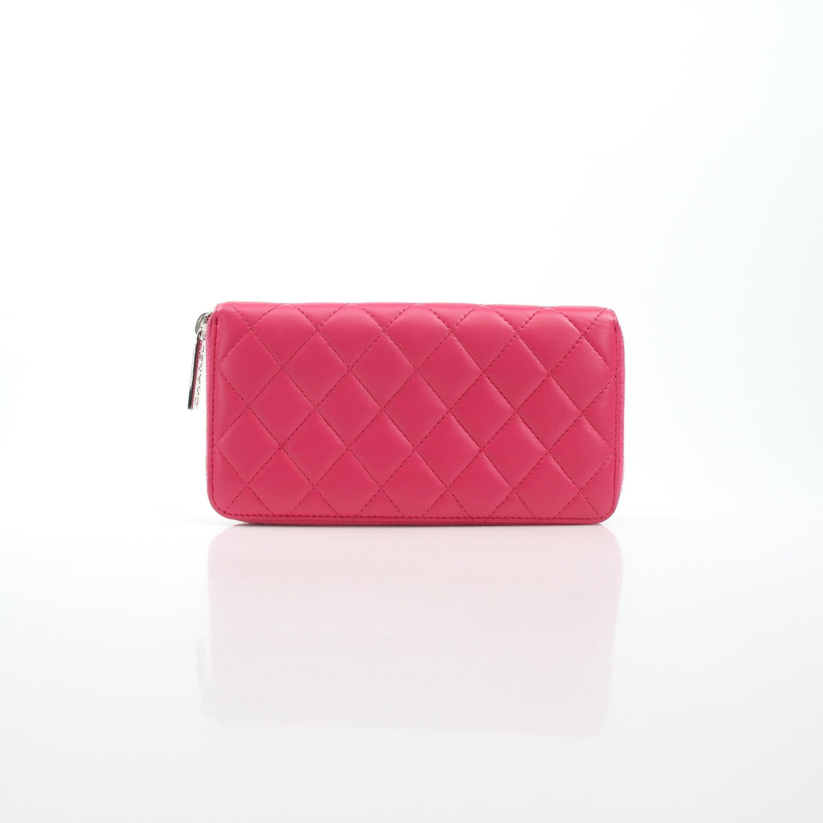 Chanel pink zip-around long wallet by Gold & Beyond, shown closed from the front