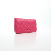 Pink Chanel zip-around long wallet by Gold & Beyond.