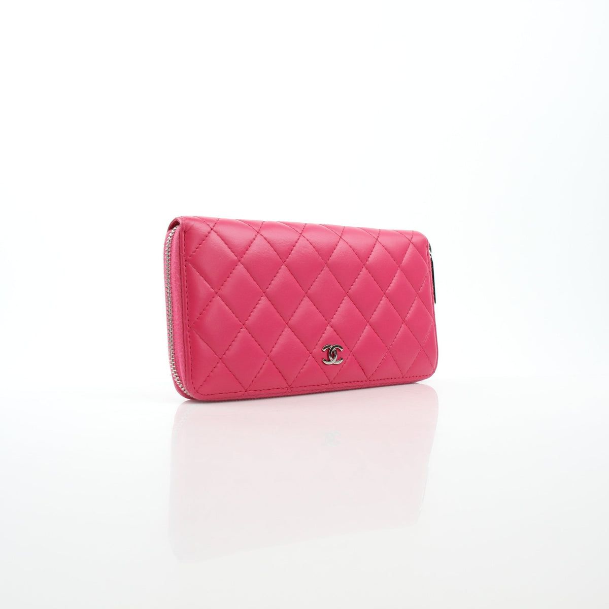 Pink Chanel zip-around long wallet by Gold & Beyond.