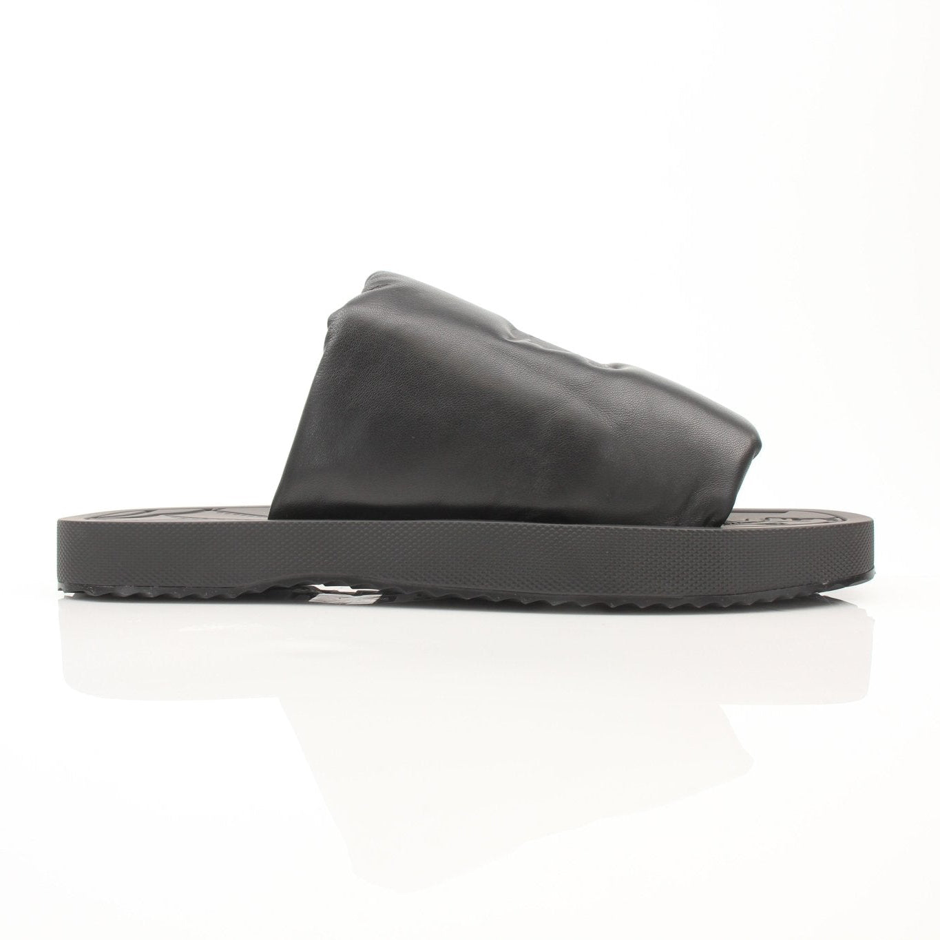 Black Burberry Knight Slab sandals by Gold & Beyond, featuring stylish open-toe design and ankle straps, showcased on a neutral background.