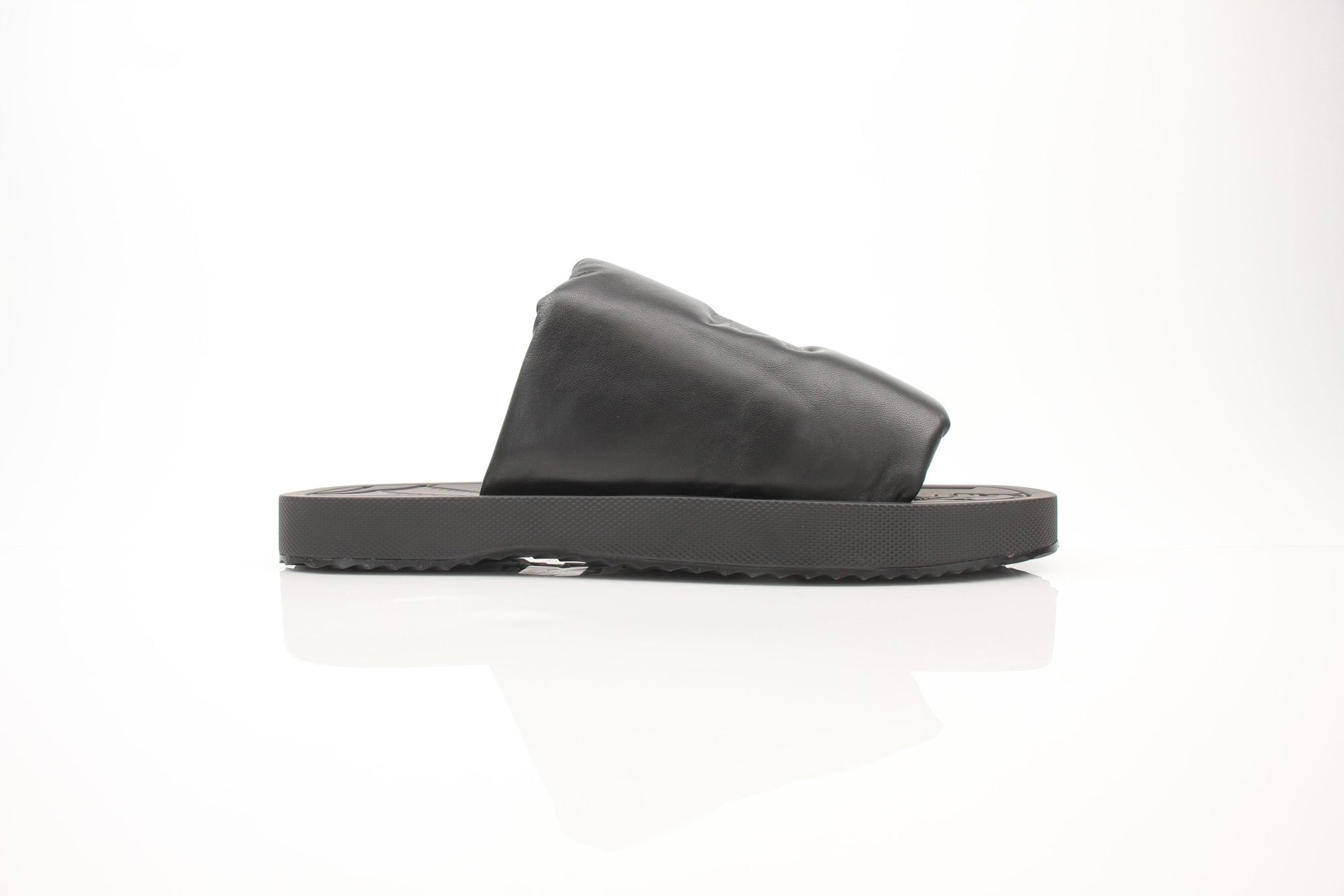 Black leather Burberry Knight Slab sandals in size 12, featuring sturdy straps and gold accents, by Gold & Beyond.