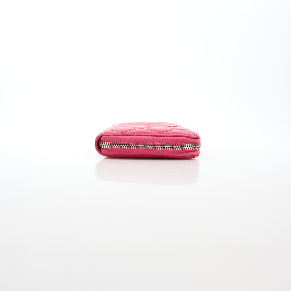 Chanel pink zip-around long wallet by Gold & Beyond, featuring a sleek rectangular design