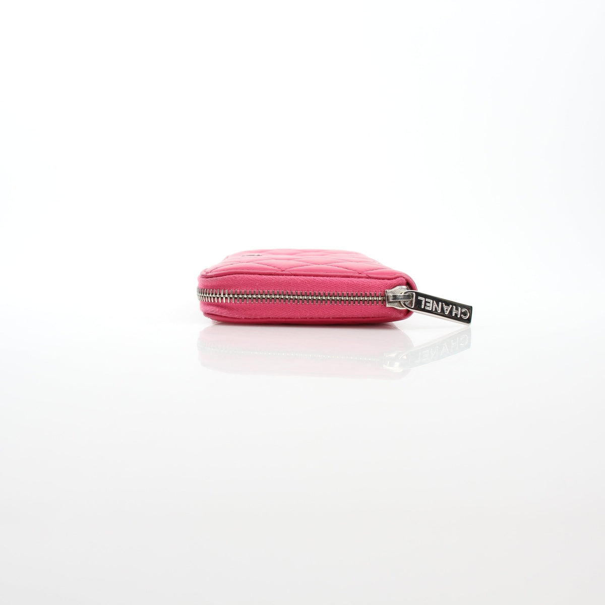 Pink Chanel zip-around long wallet by Gold & Beyond, rectangular design with all-around zipper closure