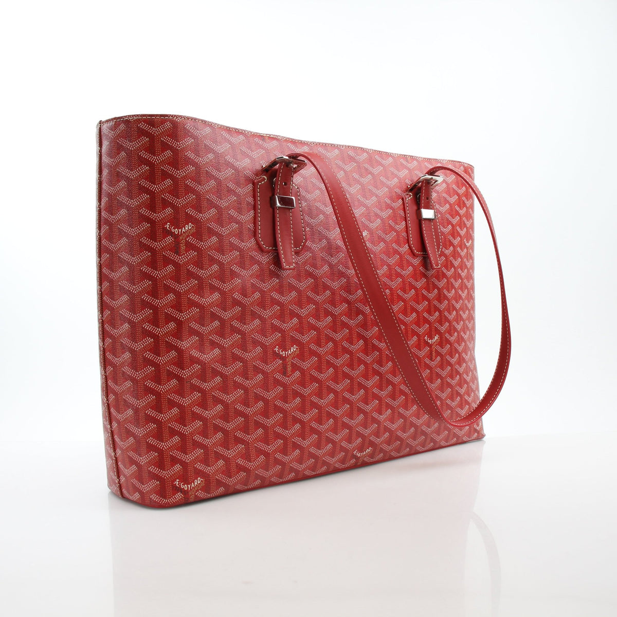 Goyard Marquises zipper tote handbag in red Goyardine coated canvas with leather handles and gold-tone hardware.