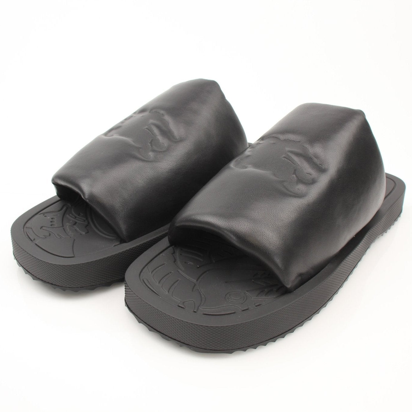 Gold & Beyond Burberry Knight Slab Black Sandals with thick soles and sleek design, displayed on a plain background.