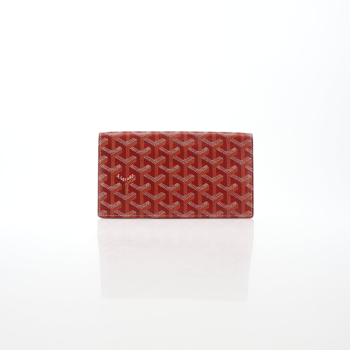Goyard Varenne Long Flap Wallet in red, gold logo accents, leather exterior, featuring multiple card slots and a sleek design.