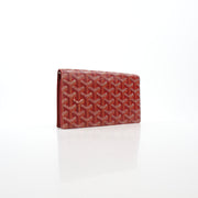 Red Goyard Varenne long flap wallet by Gold & Beyond with detailed Goyard pattern and gold-tone hardware.