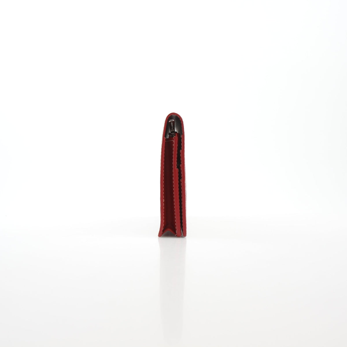 Goyard Varenne long flap wallet in red with gold accents, featuring multiple card slots and a sleek, stylish design.