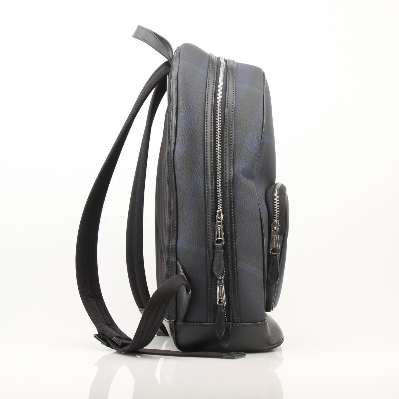 Gold & Beyond Burberry Blue Haymarket Check backpack, a stylish travel bag with iconic plaid pattern and leather accents.