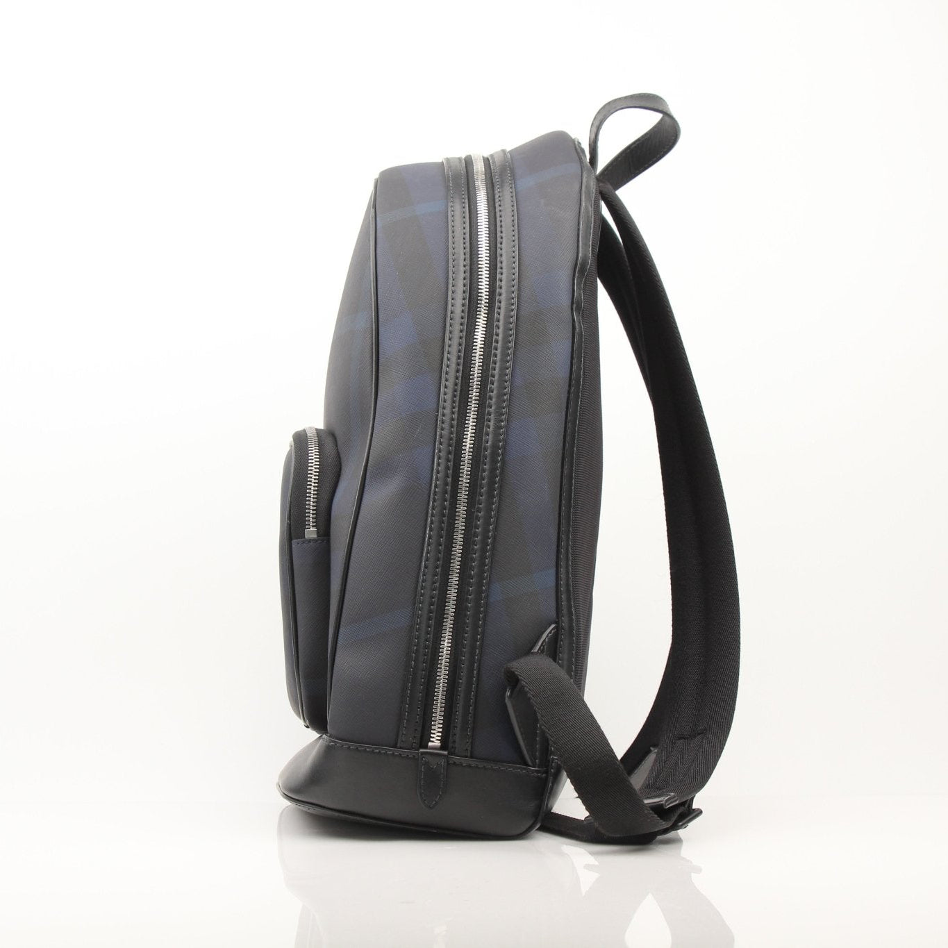 Gold & Beyond Burberry Blue Haymarket Check backpack for travel, featuring signature check pattern and sturdy design.