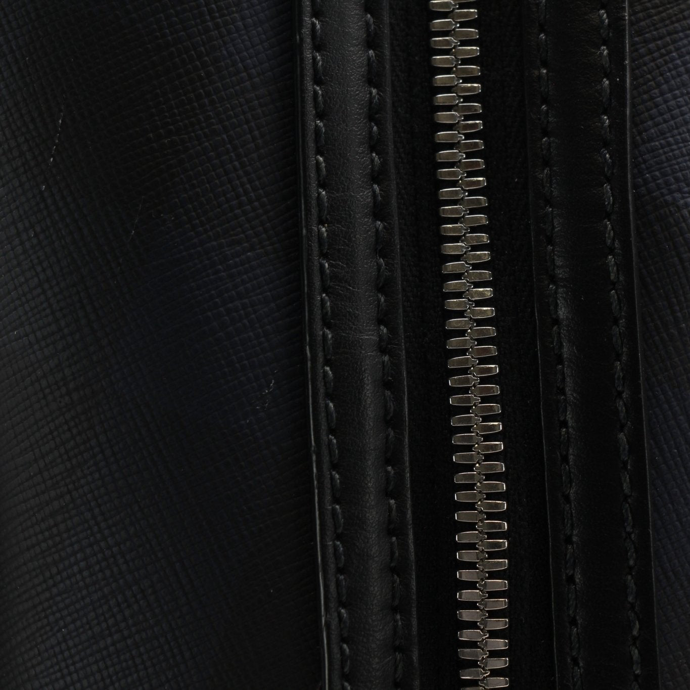 Gold & Beyond Burberry Blue Haymarket Check backpack with leather straps, ideal for travel and everyday use.