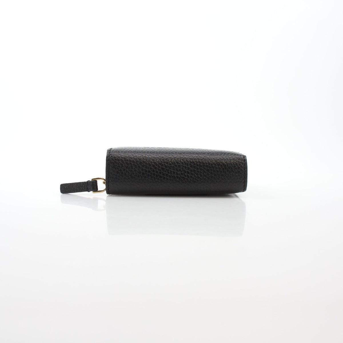 Black Marc Jacobs The Leather Mini Compact Wallet with gold-tone detailing and compact design.