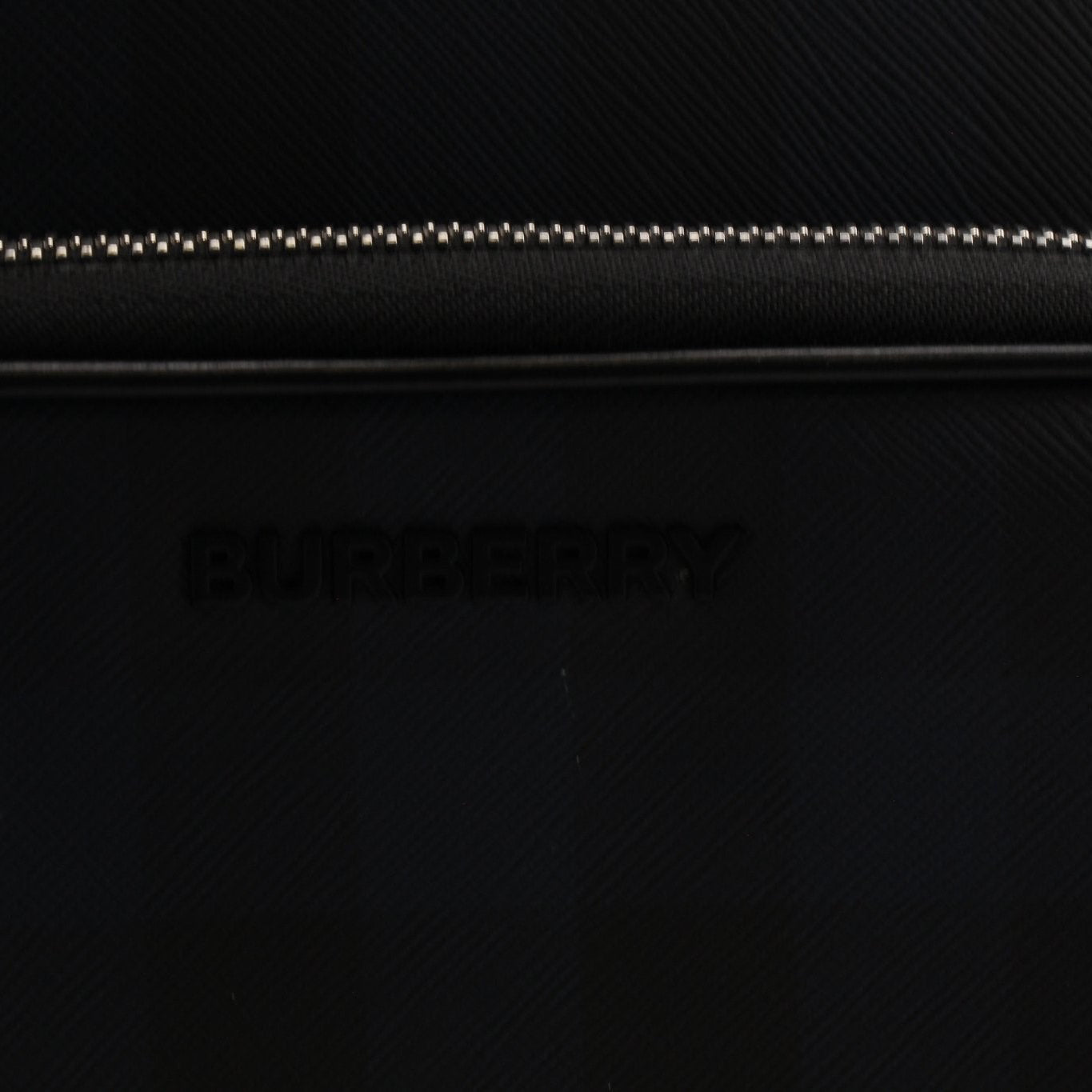 Gold & Beyond Burberry Blue Haymarket Check backpack, stylish travel bag with signature check pattern and adjustable straps.