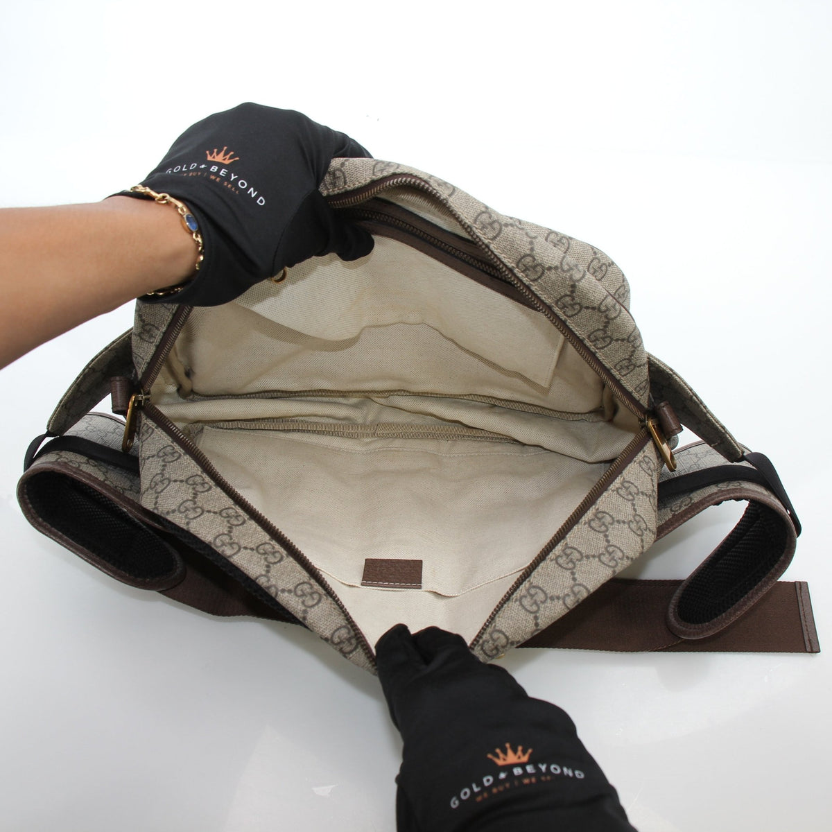 Gucci Ophidia GG Supreme medium belt bag in beige and ebony leather with gold accents, stylish handbag for everyday use.