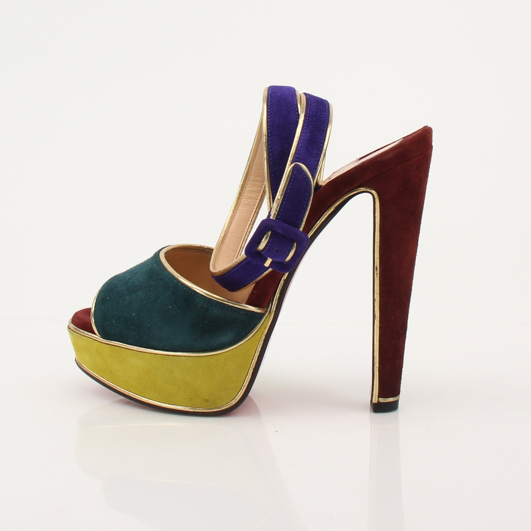 Gold & Beyond Christian Louboutin LouLou Dance Platforms heels with gold accents and stylish design, viewed from the side.