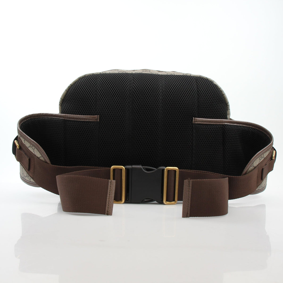 Gucci Ophidia GG Supreme medium belt bag in beige and ebony with adjustable strap and signature canvas pattern.