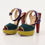 Gold & Beyond Christian Louboutin LouLou Dance Platforms heels with gold accents and high stiletto heel, stylish and elegant footwear.