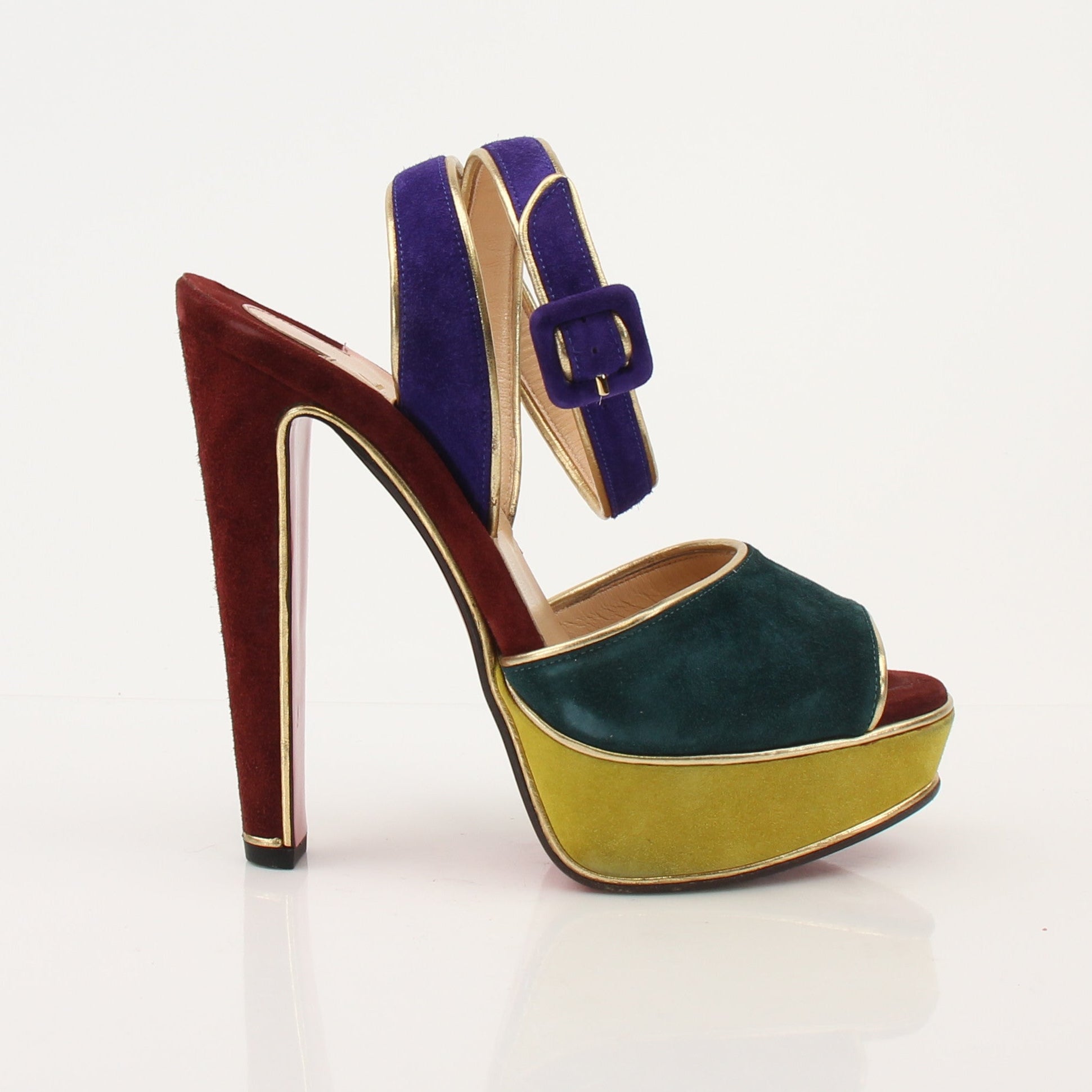 Gold & Beyond Christian Louboutin LouLou Dance Platform heels with gold accents, high stiletto heels, and elegant design.