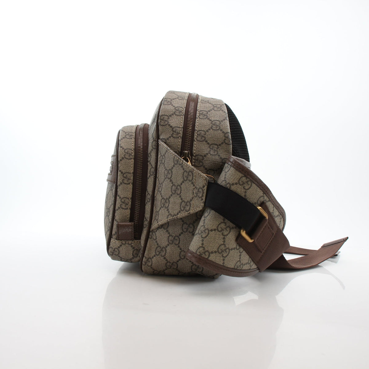 Gucci Ophidia GG Supreme medium belt bag in beige and ebony with gold accents, designed as a stylish handbag.