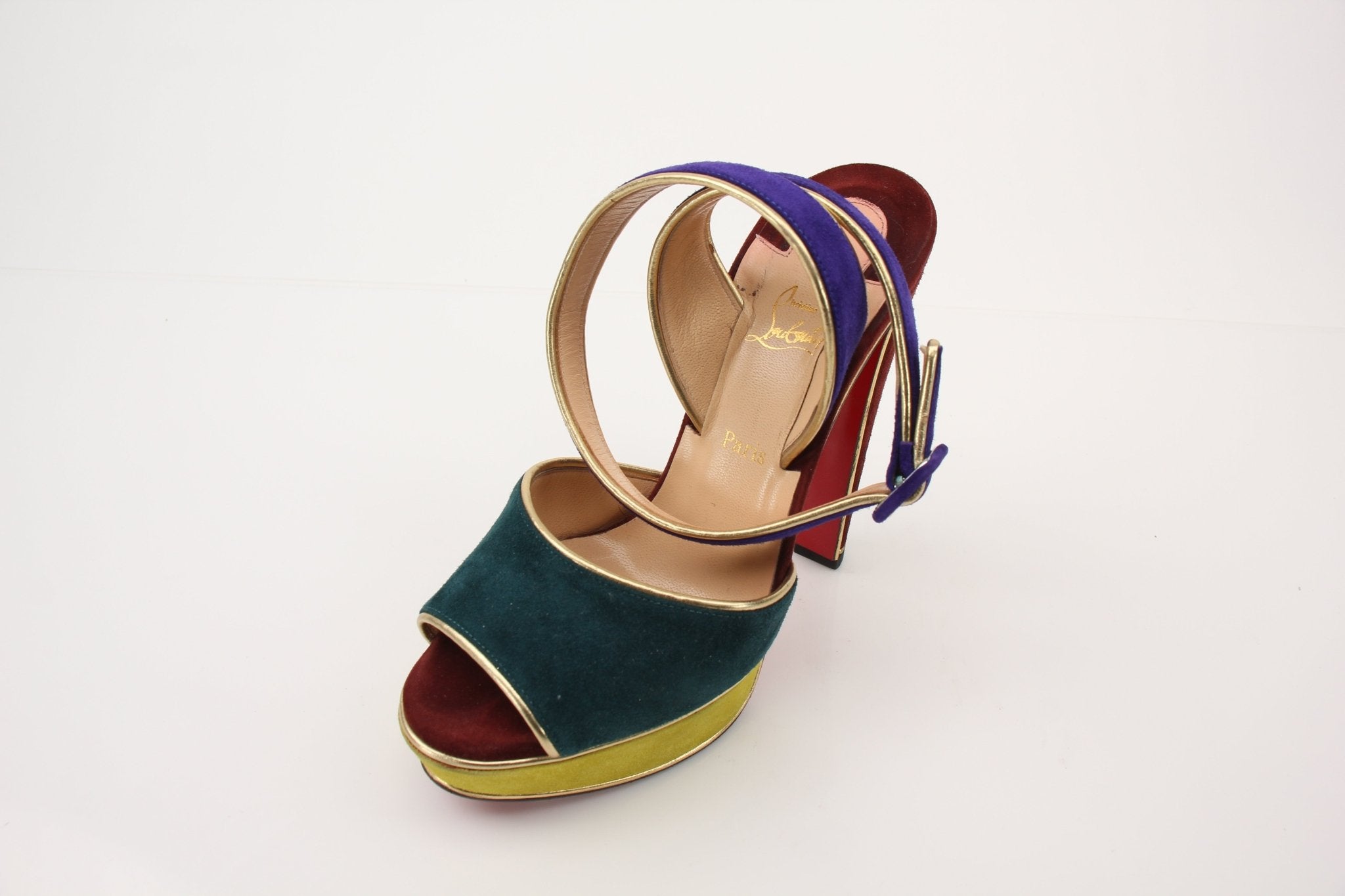 Gold & Beyond Christian Louboutin LouLou Dance Platforms heels with gold accents, high stiletto heels, and elegant design.