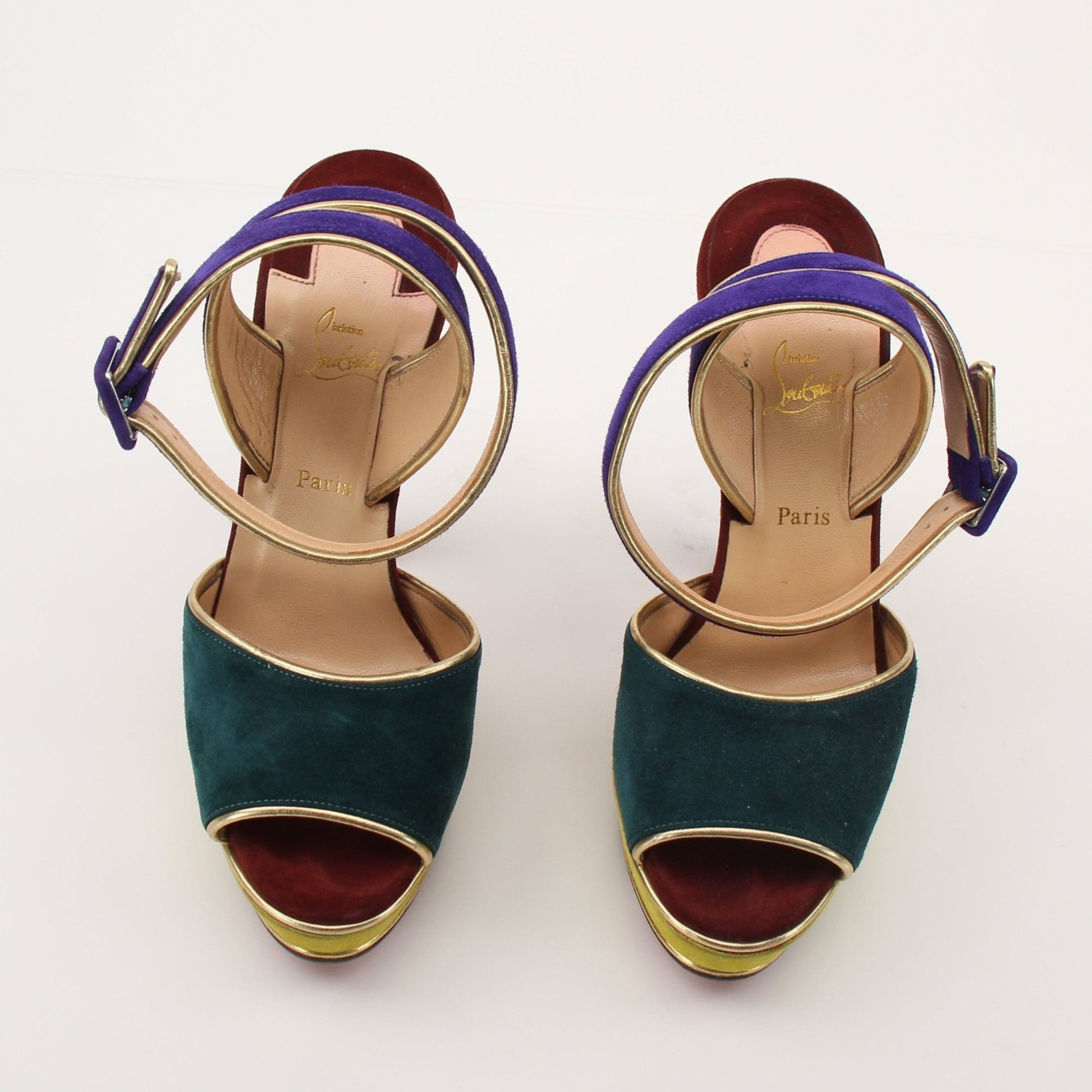 Christian Louboutin LouLou Dance platform heels with gold accents, featuring a sleek design and high stiletto heels.