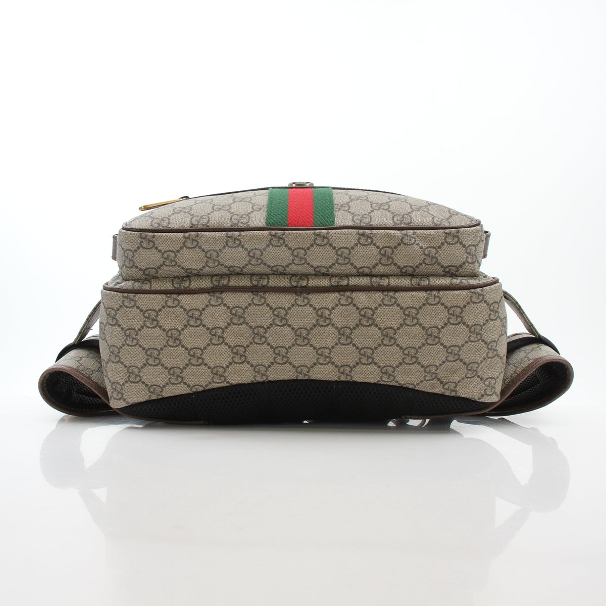 Gucci Ophidia GG Supreme medium belt bag in beige and ebony leather with gold hardware and adjustable strap.