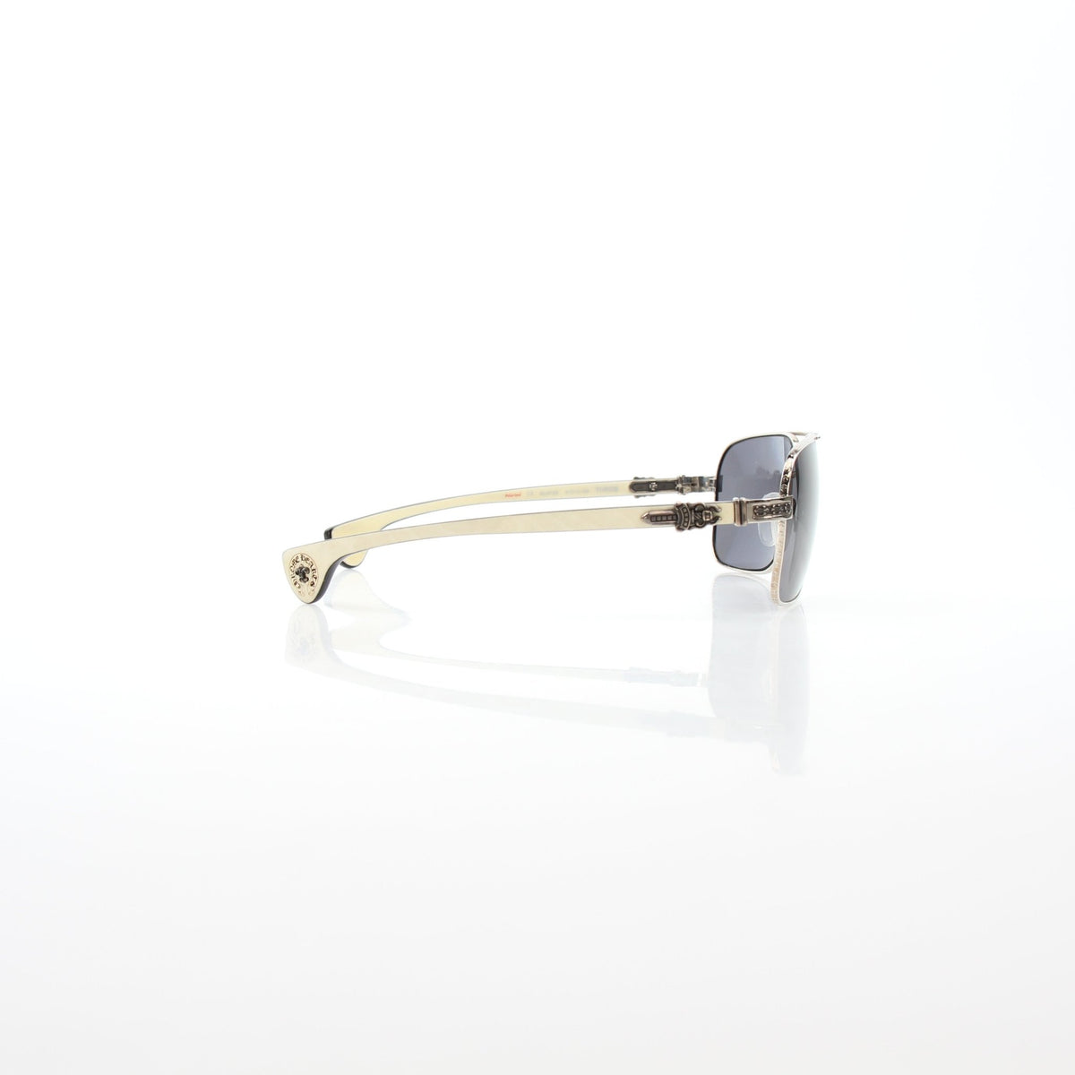 Chrome Hearts Throb aviator sunglasses with gold-tone accents, featuring sleek metal frames and tinted lenses.