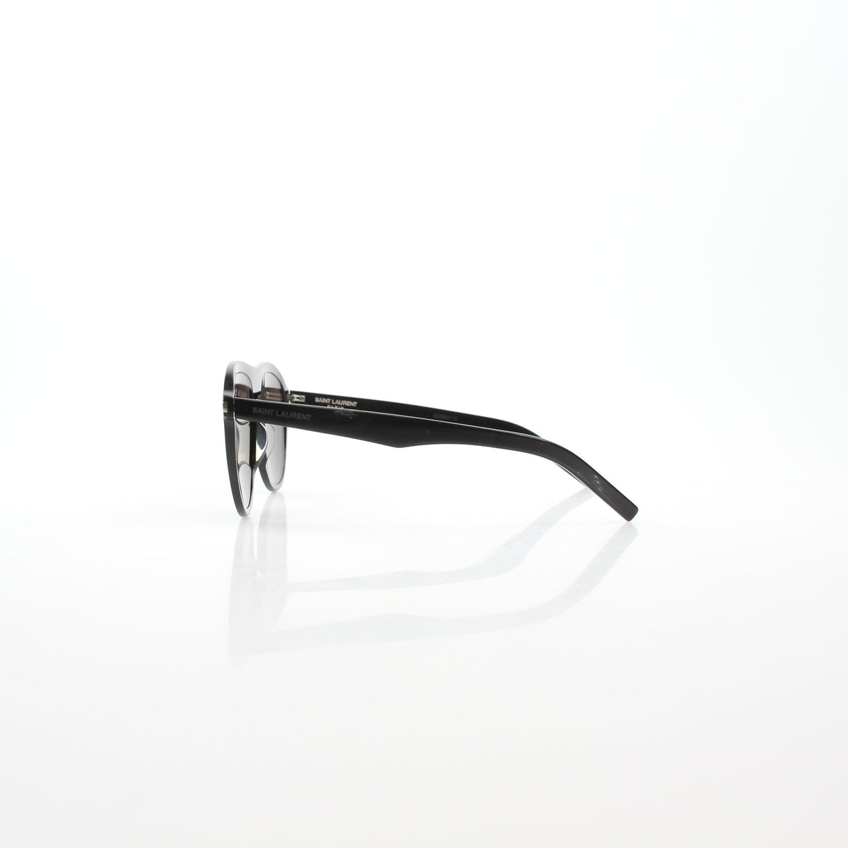 Black Saint Laurent SL 432 Slim Pilot sunglasses with gold accents, stylish accessories for a modern look.