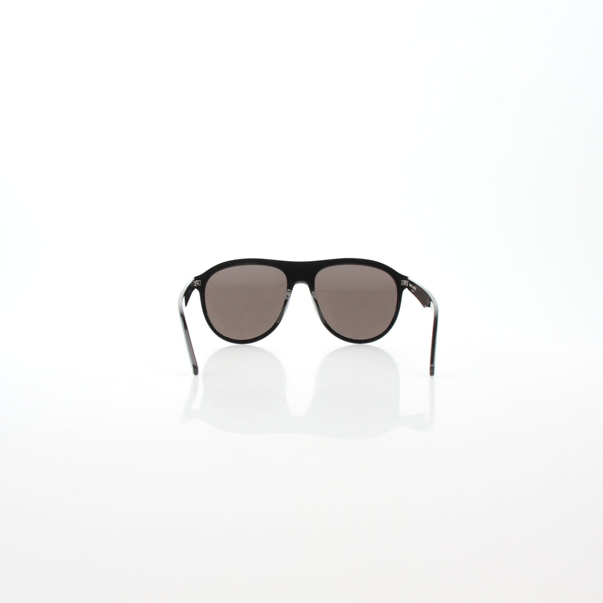 Black Saint Laurent SL 432 Slim Pilot sunglasses with gold accents, featuring a sleek design and tinted lenses.