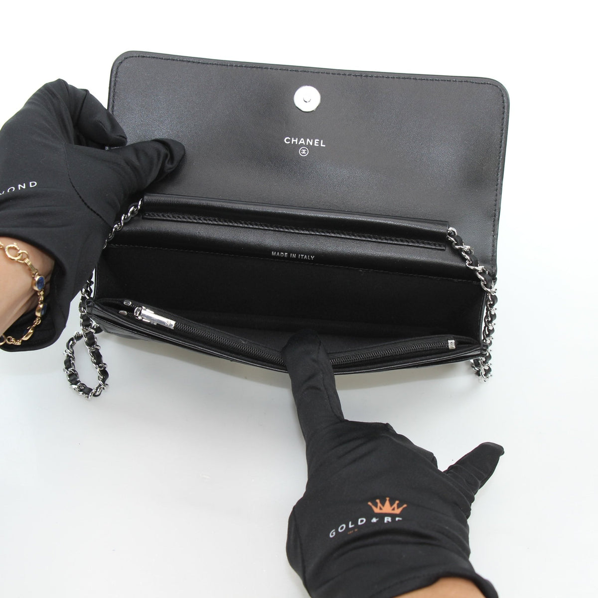 Chanel Crystal Star Wallet on Chain handbag in black quilted lambskin with crystal embellishments, featuring a chain strap.
