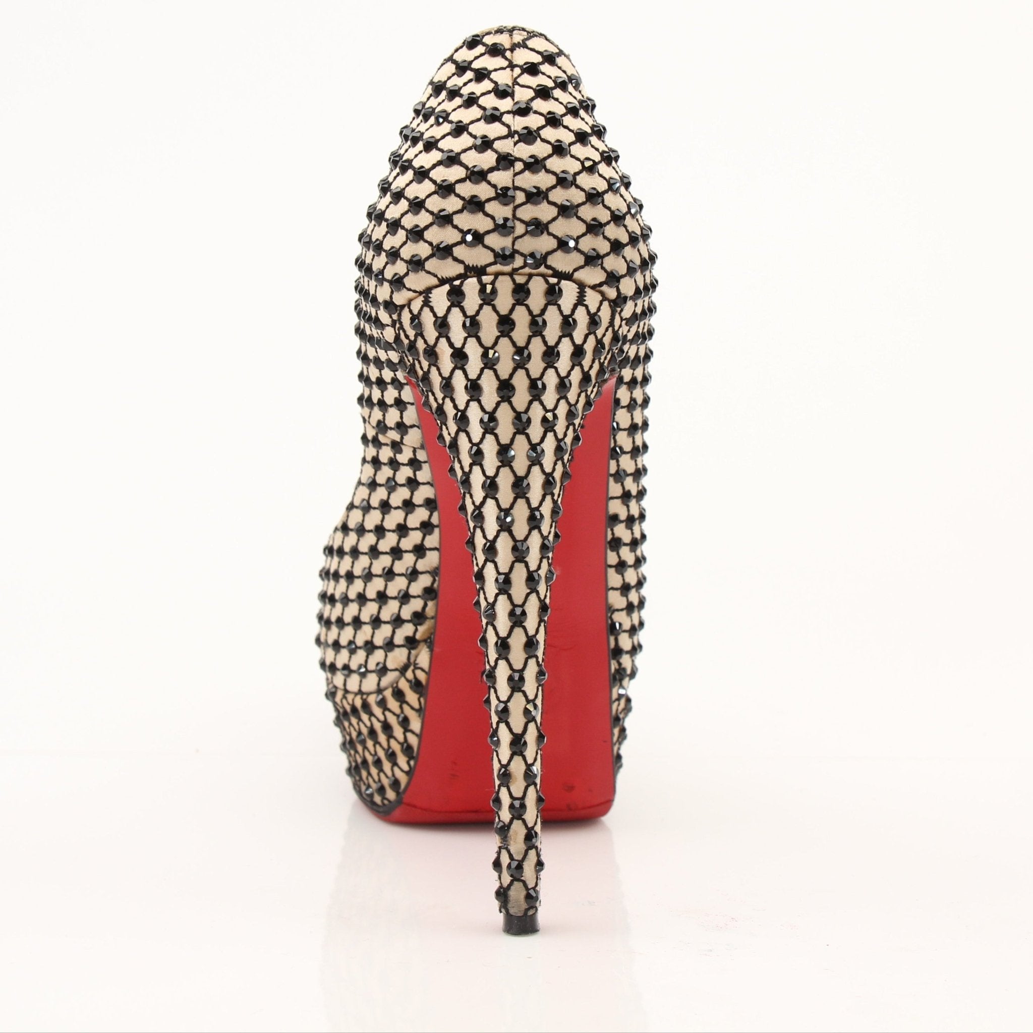 Christian Louboutin Lady Peep Pumps in black heels with signature red soles, stylishly displayed on a neutral background.