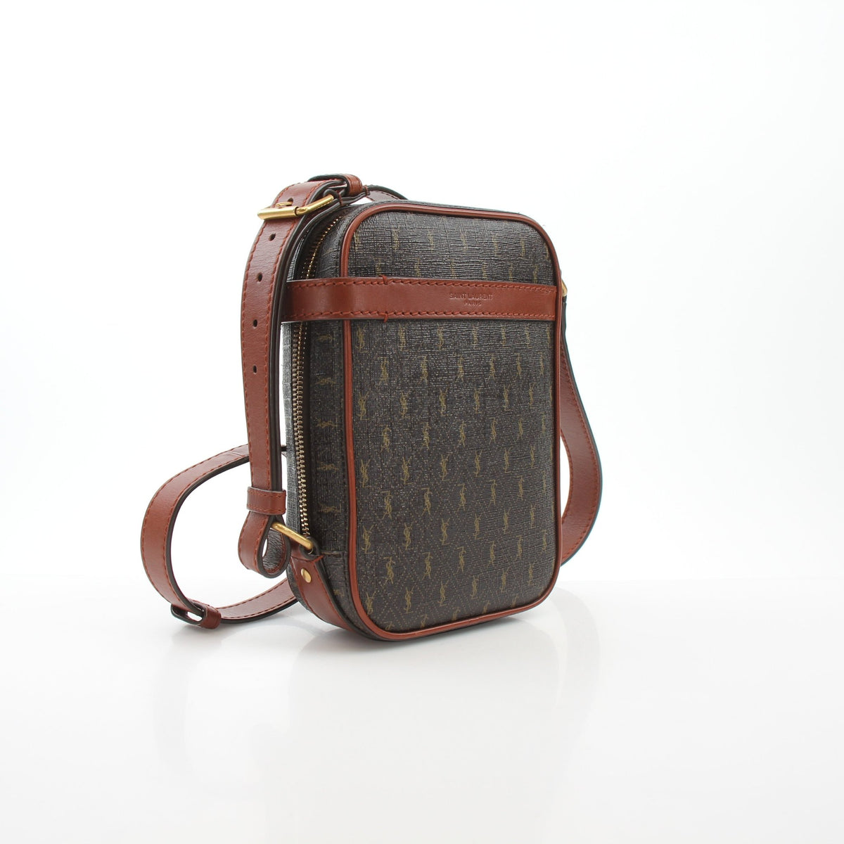 Brown Saint Laurent Le Monogramme crossbody pouch handbag with gold hardware and adjustable strap.
