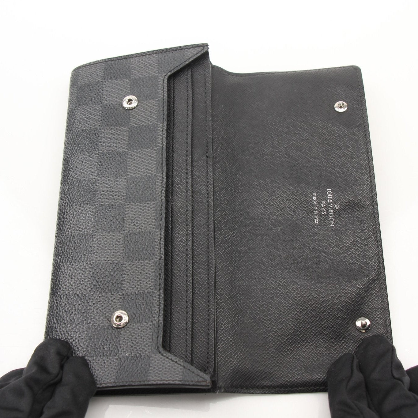 Louis Vuitton Portefeuille Marco wallet by Gold & Beyond, featuring a sleek leather design with multiple card slots and a zippered coin pocket.