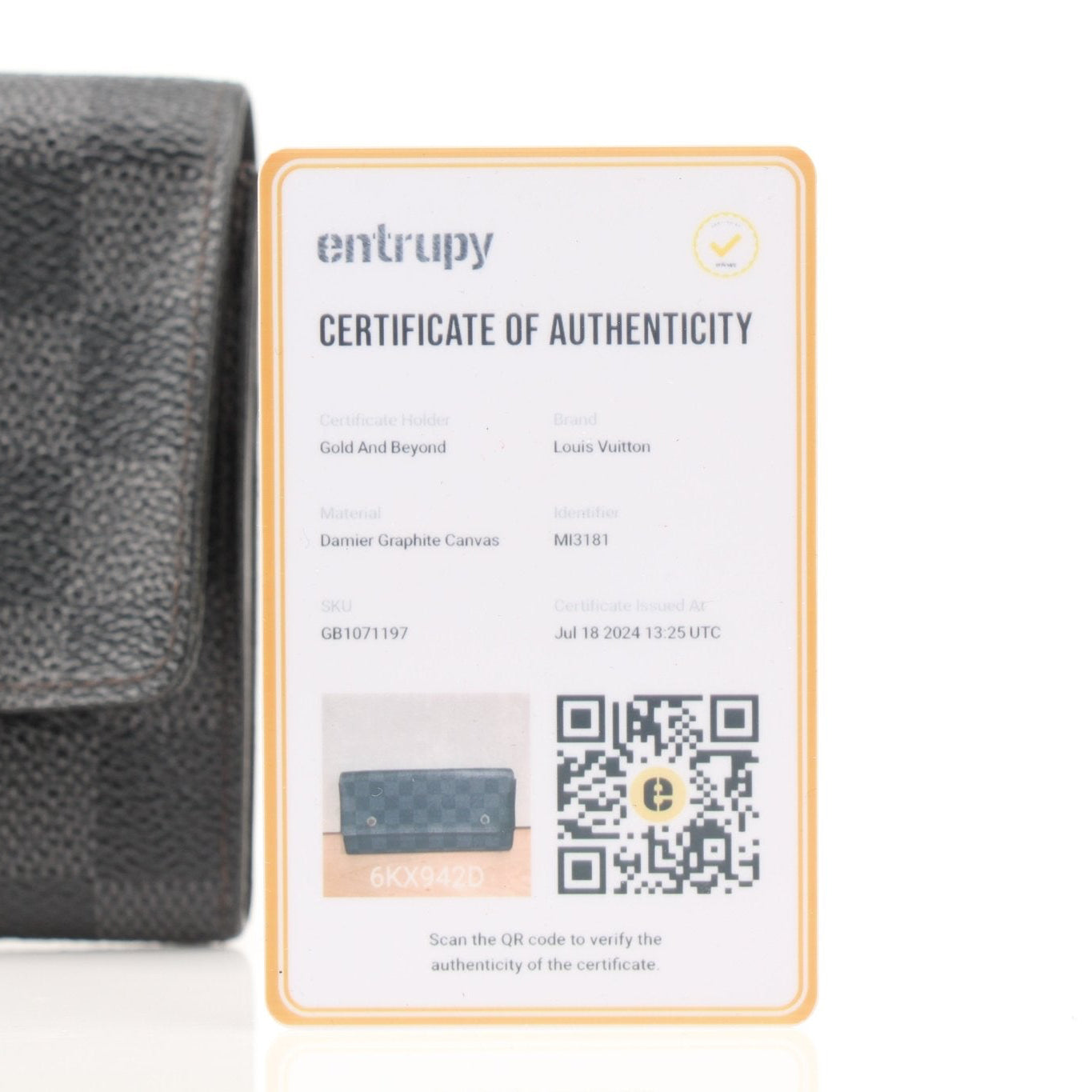 Gold & Beyond Louis Vuitton Portefeuille Marco wallet, black leather with gold-tone accents and multiple card slots.