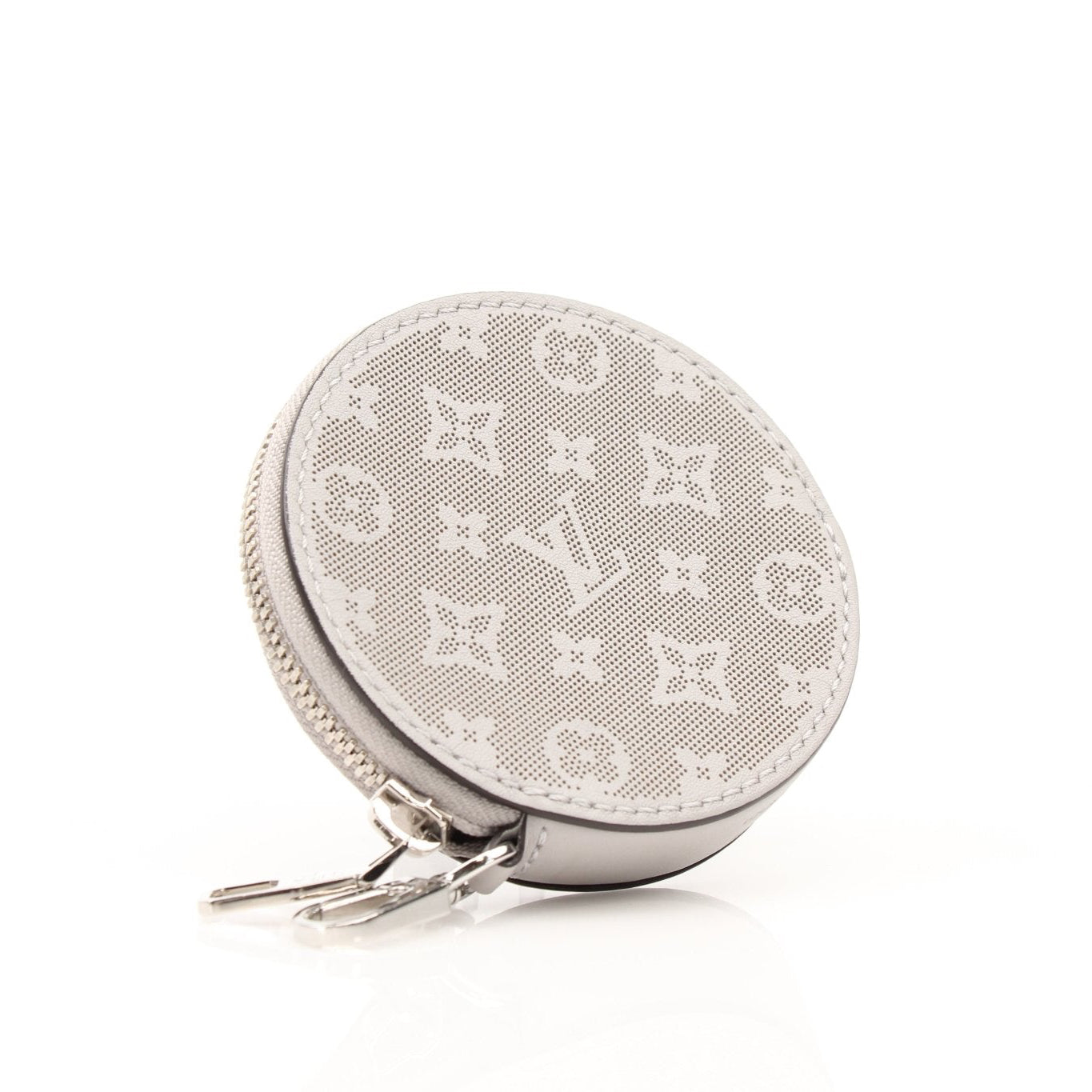 Gray Louis Vuitton round bag charm accessory with gold accents, designed to add a stylish touch to handbags.